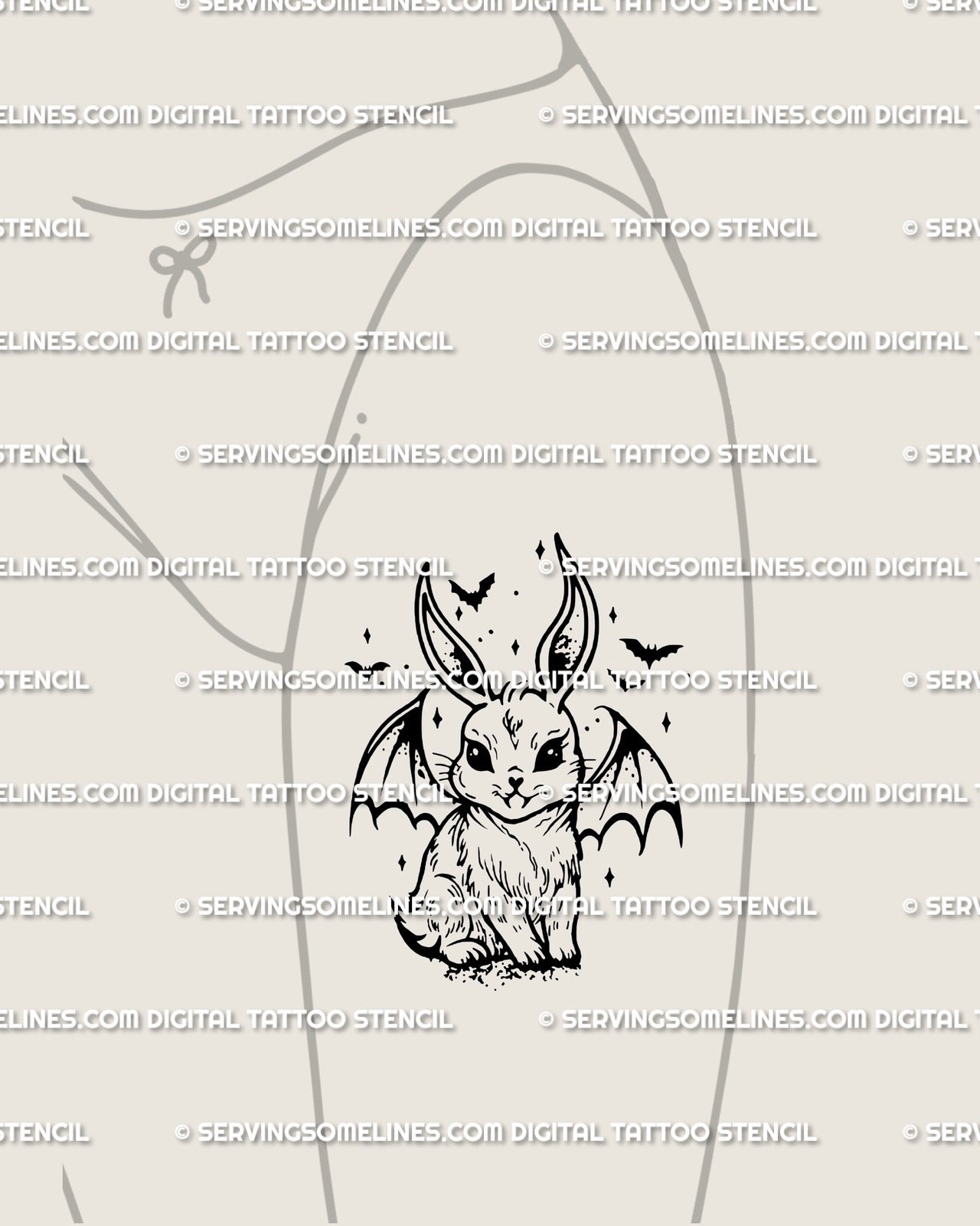 Spooky cute bunny with bat wings displayed as thigh tattoo, evil kawaii Halloween flash idea for women.