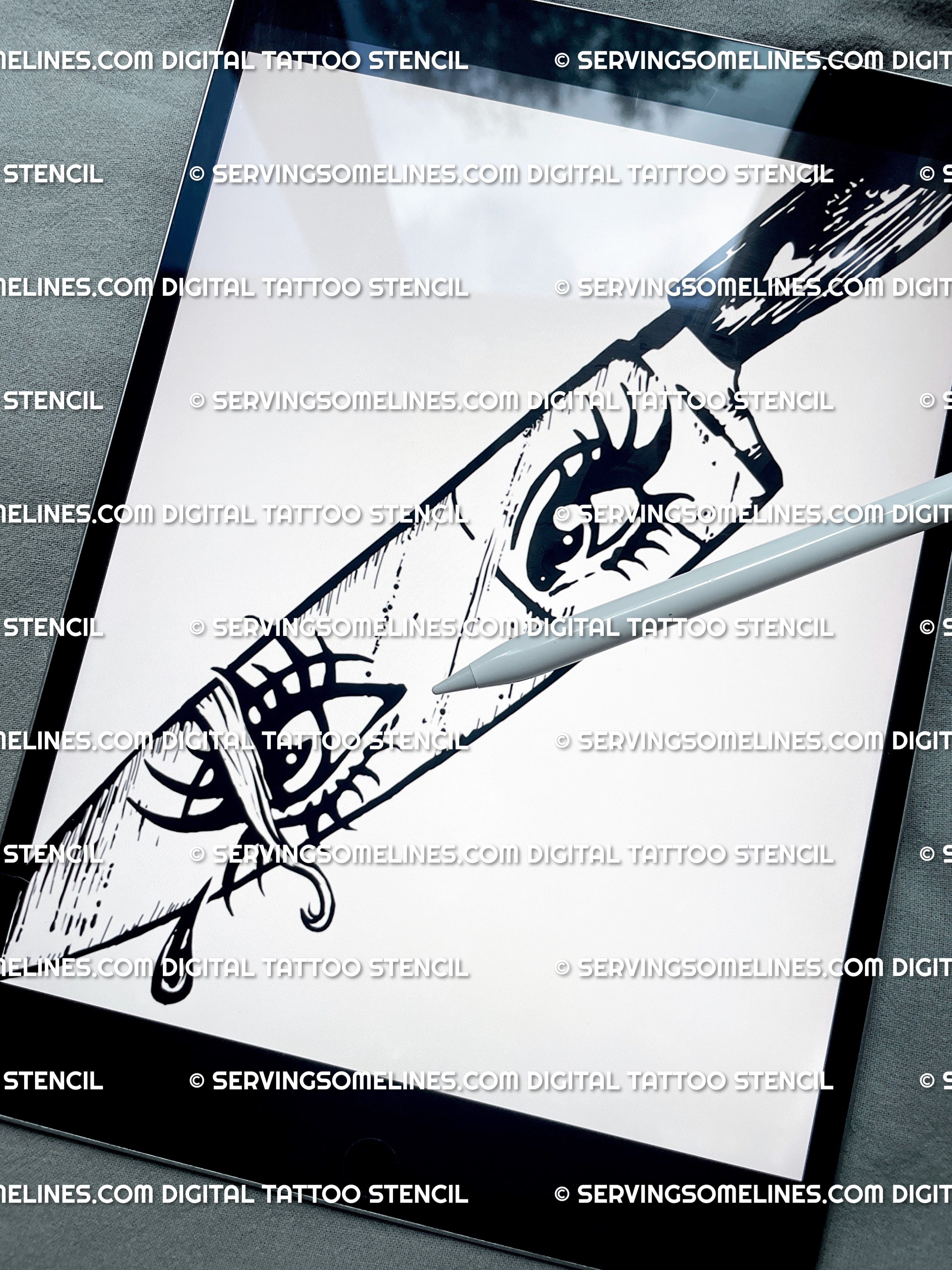 Gothic knife tattoo drawing shown on iPad preview, reflection dagger flash with crying girl face inside the blade.