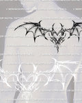 gothic winged heart tattoo stencil shown on a man’s upper back, dark demon wing design for gothic tattoo patterns and chest to back layouts