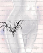gothic bat wing heart tattoo shown on women’s hip placement featuring dark feminine wings and tribal gothic lines for alternative tattoo ideas