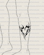 Heart tribal tattoo stencil shown on lower leg placement, heart tattoo stencil with classic tribal swoops and clear spacing.