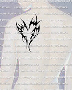 Heart tribal tattoo stencil displayed on mens shoulder placement, black tribal heart tattoo silhouette with open negative space.