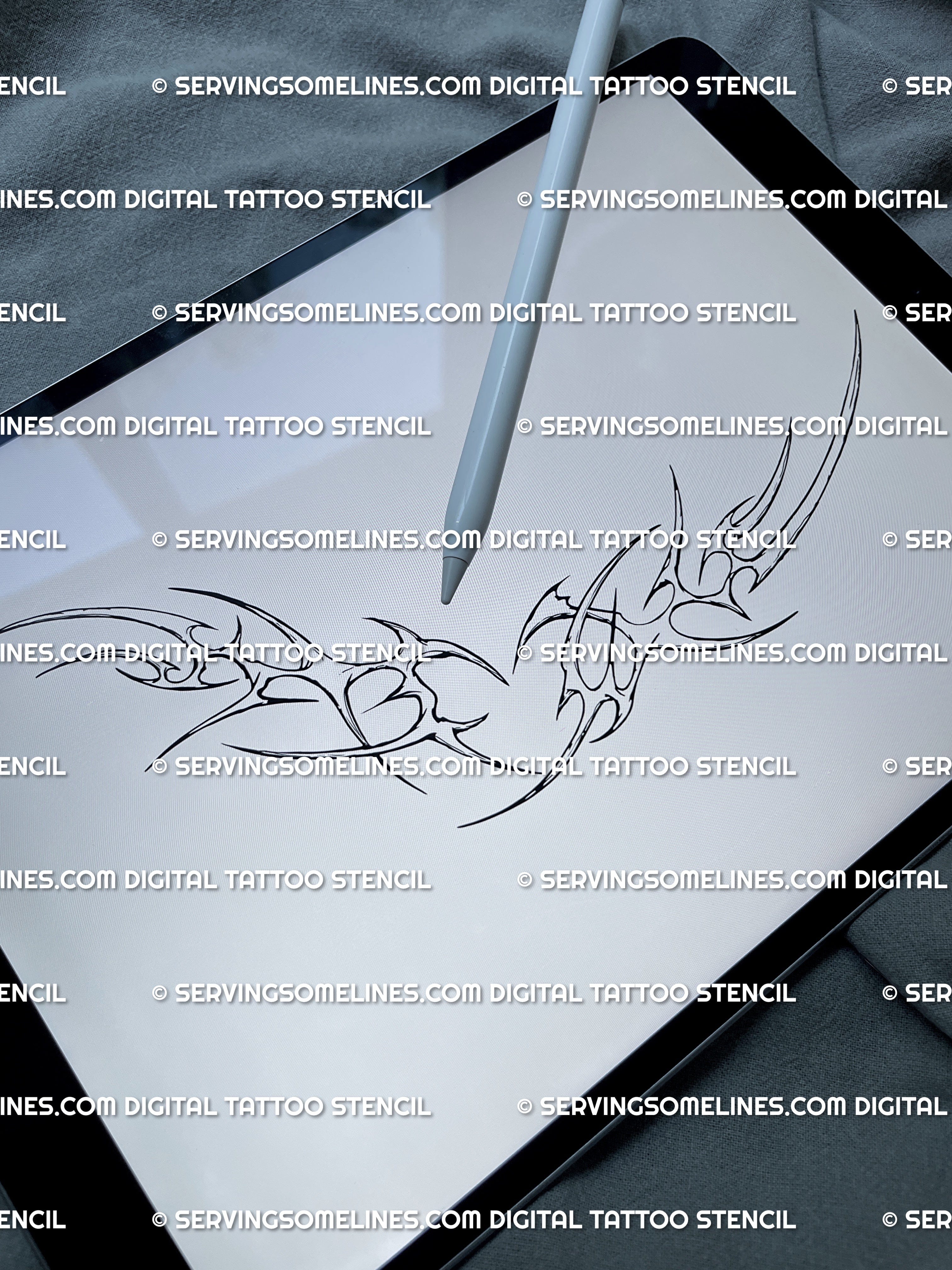 Neotribal heart tattoo design shown on iPad, gothic feminine tattoo stencil with ornamental thorn details in cyber sigil style.