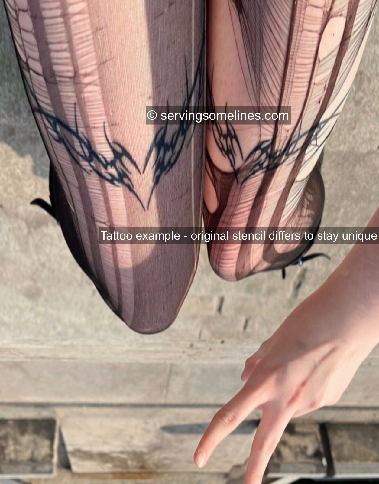 Neotribal heart matching tattoos shown healed on front thigh skin, based on this stencil design