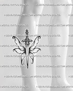 Ornamental dagger tattoo stencil shown on calf, with fantasy wing detail, gem hilt, and clean vertical placement.