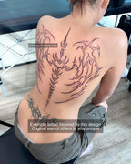 Real tattoo result on a woman’s back created from a neotribal angel wings spine tattoo stencil digital download