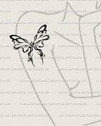 Coquette ribbon tattoo on woman’s upper arm, girly cybertribal bow design with soft gothic lines and heart center, small feminine piece.