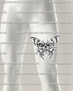 Skull butterfly tattoo stencil shown on men's front thigh, with bold skull detail, dark wings, and clean large placement view.