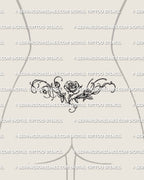 Smaller lower back example of the rose tattoo design, showing a softer floral fit across the waist.