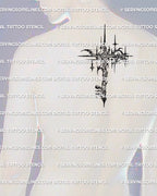 Star key tattoo stencil displayed on men’s upper back placement, long vertical key with compass-star head.