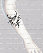 Thorn heart forearm tattoo stencil in dark tribal linework, minimalist gothic blackwork design with curved spikes forming a heart. 