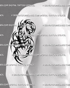 Tribal scorpion tattoo shown on men’s upper arm with heavy black curves, spiked body details, and a sharp stinger.