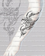 Vertical lotus tattoo stencil shown on forearm placement preview, cybersigilism flower design for clean transfer.