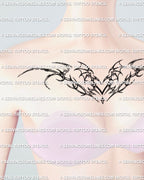 cybersigil winged heart tattoo across the collarbone with delicate emo linework, subtle gothic flow, and gentle upward wings
